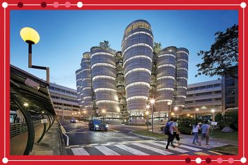 Campus with marked pedestrian crossing and illuminated Learning Hub. NTU - Nanyang Technological University, Singapore Campus with marked pedestrian crossing and illuminated Learning Hub. NTU - Nanyang Technological University, Singapore