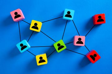 A network of wooden blocks with people icons on them