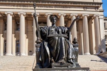 New York, NY - October 15, 2020 Alma Mater is a bronze sculpture by Daniel Chester French which is located on the steps leading to the Low Library on campus of Columbia University in Manhattan, New York City