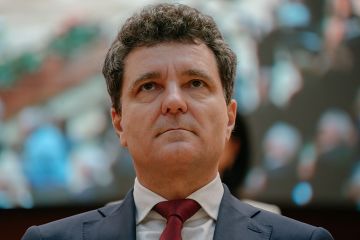 Romanian President Nicusor Dan listens to the Romanian anthem before taking the oath as new president in the Romanian parliament, on 26 May 2025 in Bucharest, Romania.