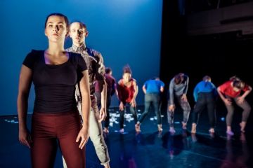 Students perform Taking a Position
