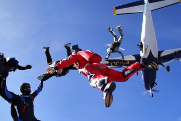 October 9, 2008. Proenca to Nova, Portugal. Paratroopers get out of an aircraft together.