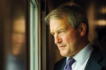 Owen Paterson looking out of window