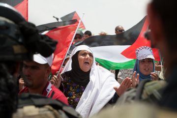 Palestinian women confront Israeli soldiers in a demonstration near Susya in the South Hebron Hills Palestinian women confront Israeli soldiers in a demonstration near Susya in the South Hebron Hills