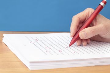 manuscript being corrected manuscript-being-corrected-red-pen