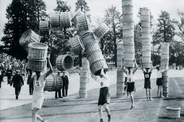 People taking part in basket carrying contest, London People taking part in basket carrying contest, London