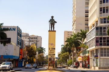 the statue that is right in the middle of Praça do Bandeirante in Goiania. Praça do Bandeirante em Goiânia. Bandeirante Square in Goiania. With the text "The government kills. Bolsonaro Out", painted
