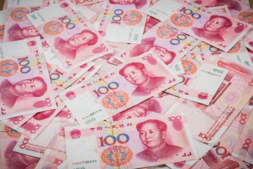 Pile of Chinese currency 100s of yuan