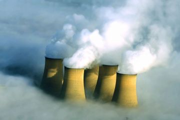 Power station chimneys engulfed in fog Power station chimneys engulfed in fog