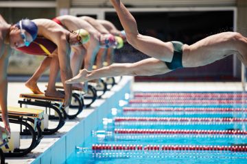 Professional swimmer diving on false start Professional swimmer diving on false start