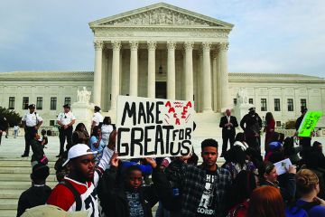 DC area students protest the election of President-elect Donald Trump, in front of the US Supreme Court