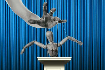 Puppet at a lectern. To illustrate comments made by David Willetts that government should stop trying to micromanage university provision