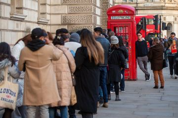 People are seen waiting in a queue for a red phone box in Westminster, London. To illustrate that free speech complaints scheme legislation is unlikely to come to fruition for several years. People are seen waiting in a queue for a red phone box in Westminster, London. To illustrate that free speech complaints scheme legislation is unlikely to come to fruition for several years.