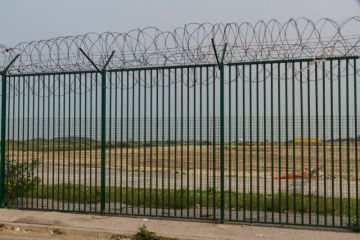 Razor wire guarding ferry terminal in Calais, France