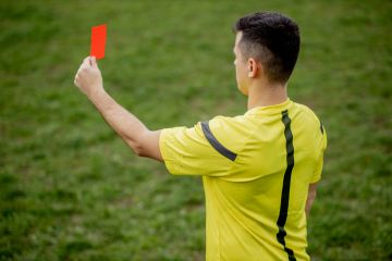 Referee showing a red card