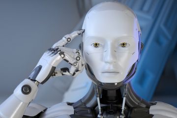 A robot points to its head A robot points to its head, symbolising memory