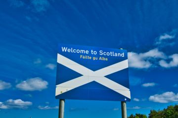 Saltire of Scotland on a sign saying 'Welcome to Scotland' Saltire of Scotland