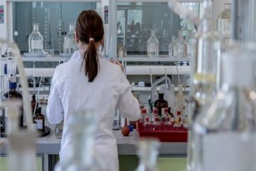 A woman works in a laboratory