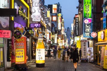 Seoul, South Korea - May 13, 2017 People wander in the busy streets of the Insadong entertainment district lined with bars and restaurants at night