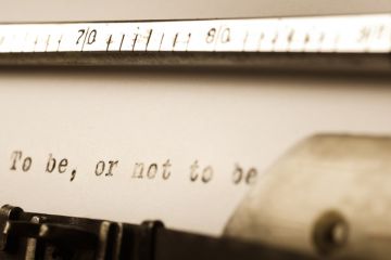 A line of Shakespeare on a piece of typewriter paper