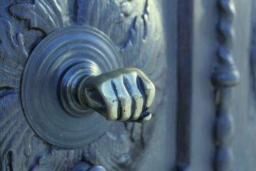 Shut door with fist