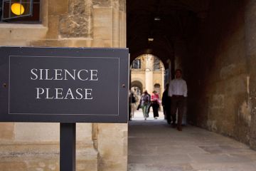 Silence please sign at university, UK. To illustrate free speech fears as campus critics are denied emeritus status.
