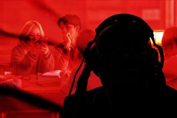 Silhouette of spy with headphones listening to students.