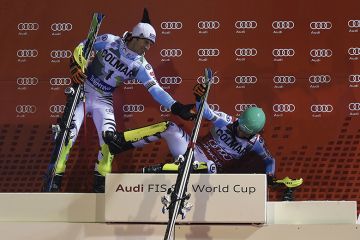 Skiers on a podium