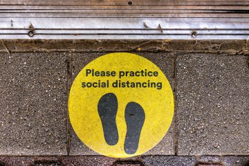 a social distancing sign