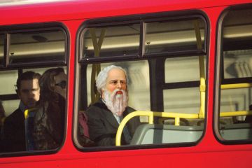 Socrates sitting on top deck of London bus Socrates sitting on top deck of London bus
