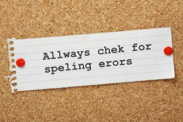 Spelling mistake/typo pinned to corkboard Spelling mistake/typo pinned to corkboard