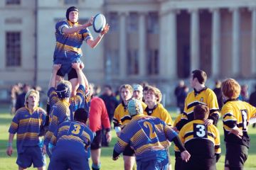 Students playing rugby, Stowe School, Buckingham, England Students playing rugby, Stowe School, Buckingham, England