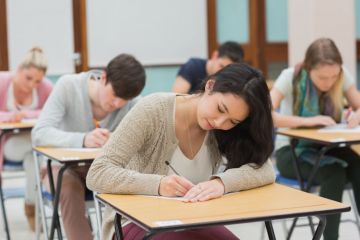 Students taking an exam Students taking an exam