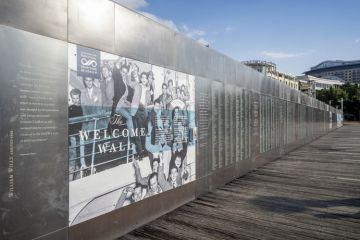 Sydney, Australia - May 22, 2017 At the Australian National Maritime Museum. The Welcome Wall along the walkway of Pyrmont Bay jetty.