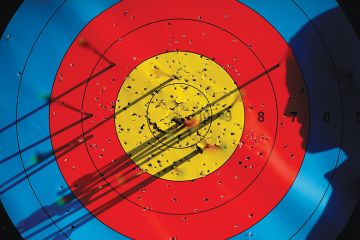 Silhouette in front of a target, symbolising targets for Office for Students under Sir Michael Barber