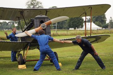 The SE5a is prepared for demonstration flight at 'The Shuttlesworth Collection' at Old Warden on July 21, 2014 in Biggleswade, England.