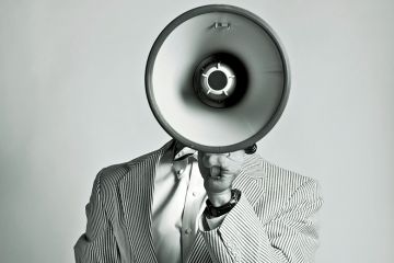 Person holding megaphone