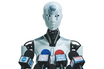 Image of a robot speaking into press microphones
