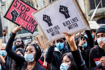 Photo of protesters in Oxford holding Black Lives Matter placards Photo of protesters in Oxford holding Black Lives Matter placards