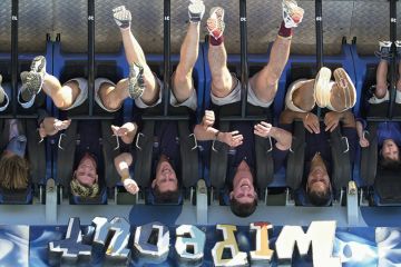 People are thrown upside down while riding the Wipeout at Dreamworld on the Gold Coast, Australia