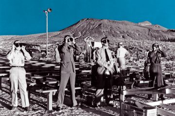 Canadian and British observers illumined by both the sun and an atomic blast of ABLE, a 1-kiloton atomic bomb. January 27, 1951