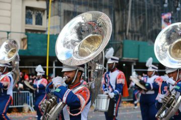 The Morgan State University Magnificent Marching Machine performs the medley of Everybody Dance during the 93rd Macy's 2019 Thanksgiving Day Parade in New York