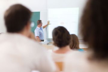 Trainee teachers studying in classroom Trainee teachers studying in classroom