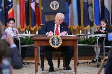 US President Donald Trump signs an executive order during an education event in the White House, Washington, DC, 20 March 2025. Trump signed an order aimed at shutting down the Department of Education, a decades-long goal on the US right. US President Donald Trump signs an executive order during an education event in the White House, Washington, DC, 20 March 2025. Trump signed an order aimed at shutting down the Department of Education, a decades-long goal on the US right.