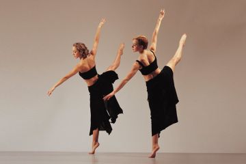 Two women dancing side by side Two women dancing side by side