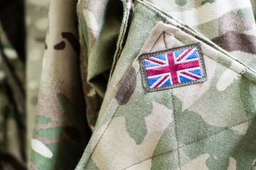 Union Jack flag on sleeve of British military camouflage uniform