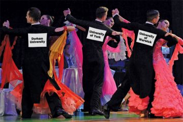 University-branded ballroom dancers dancing University-branded ballroom dancers dancing