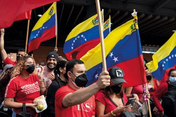 Supporters of Nicolas Maduro participate in a rally on Youth Day 