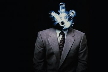 A man with a microscope for a head as a metaphor for assessing research assessment