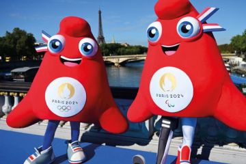 Olympic mascots at the Eiffel Tower Olympic mascots at the Eiffel Tower to illustrate Research at Olympic Games is a hot topic